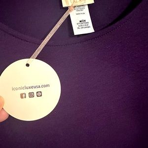 Jersey long sleeve maxi dress. Deep purple in color. New and never worn.